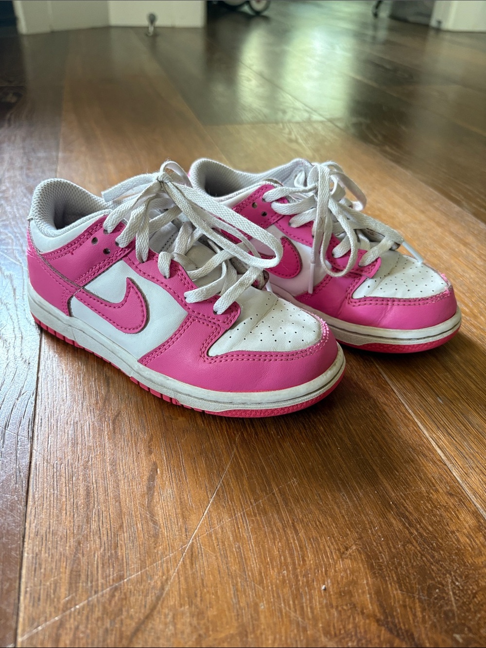 Nike Kids Pink and White Low-Top Sneakers with Swoosh